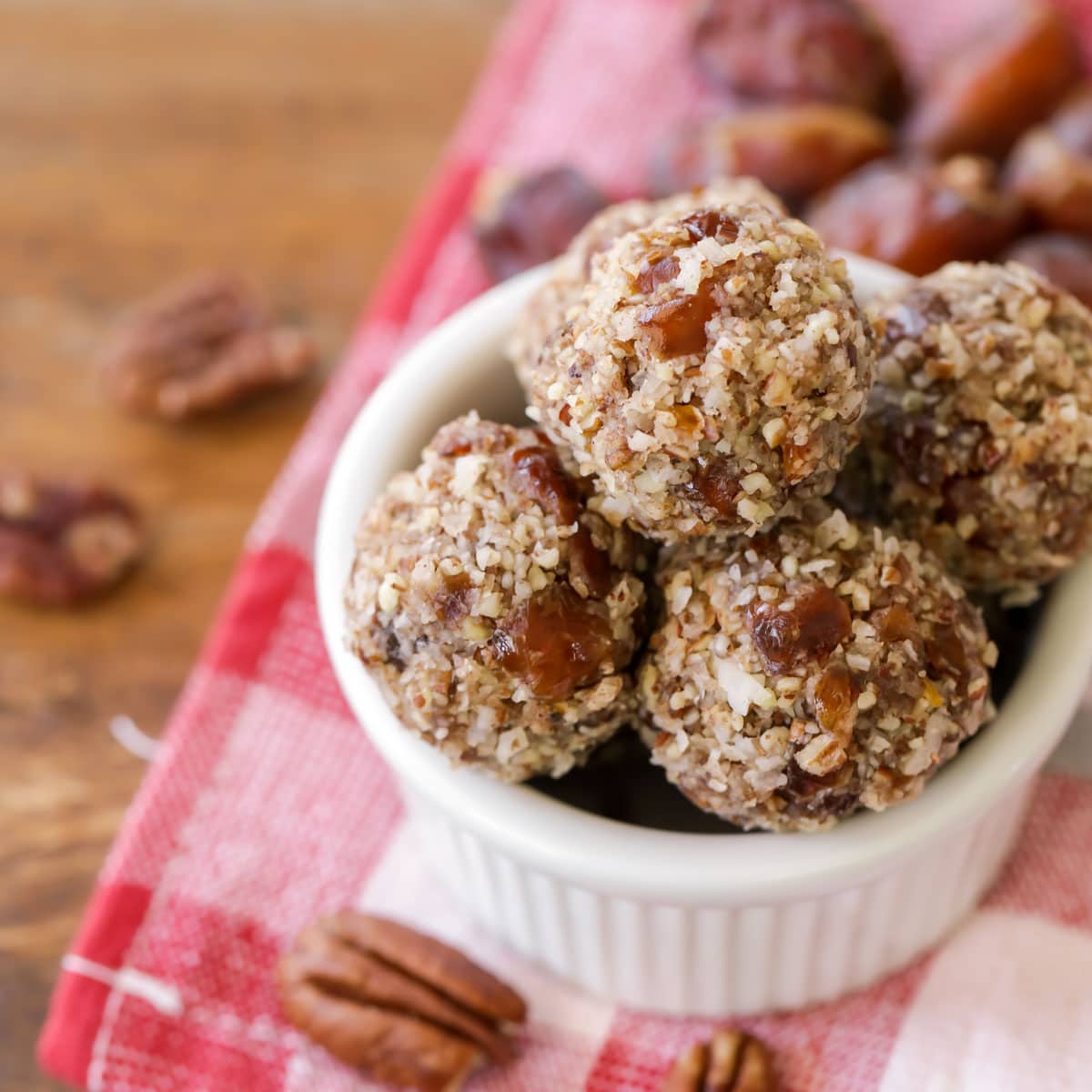 Date balls in a small serving dish