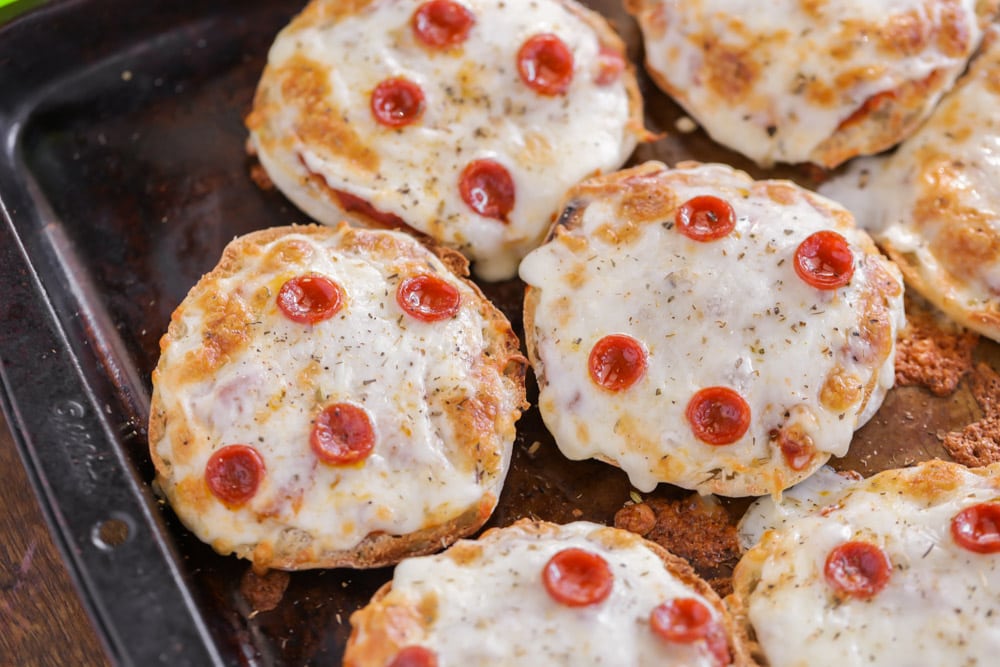 Super Bowl Appetizers - English Muffin Pizzas on a metal baking sheet. 