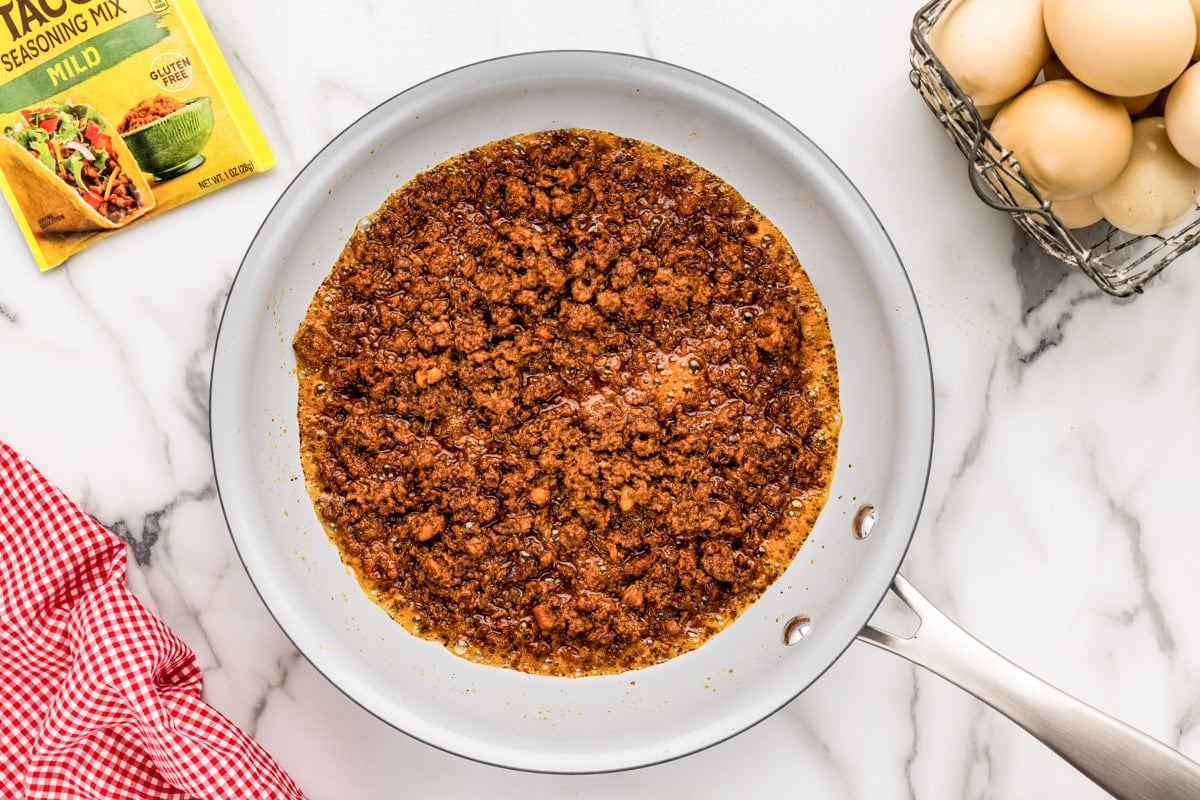 Chorizo cooked in skillet.