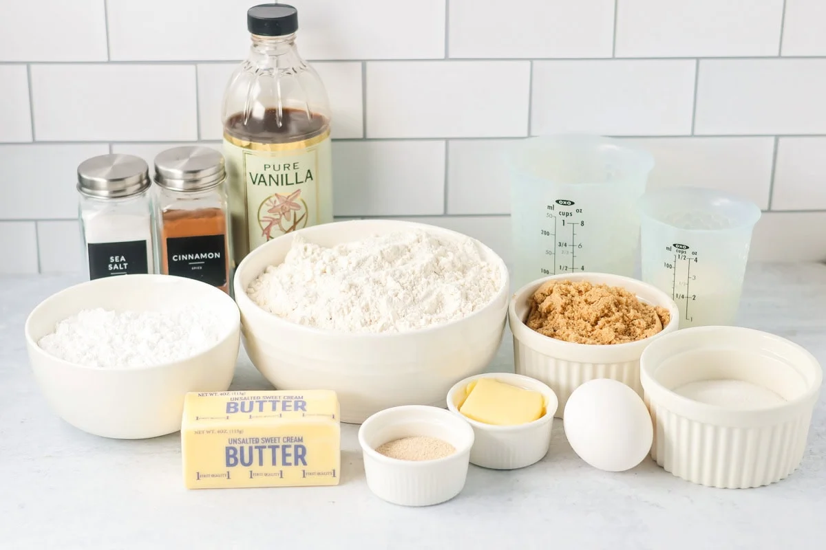 Mini cinnamon roll ingredients on a kitchen counter.