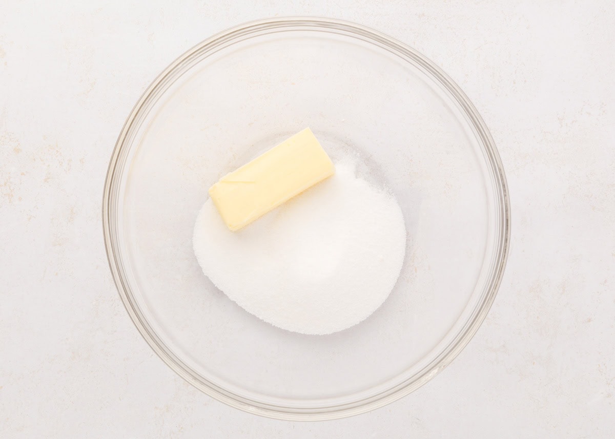 Sugar and butter in a glass bowl.
