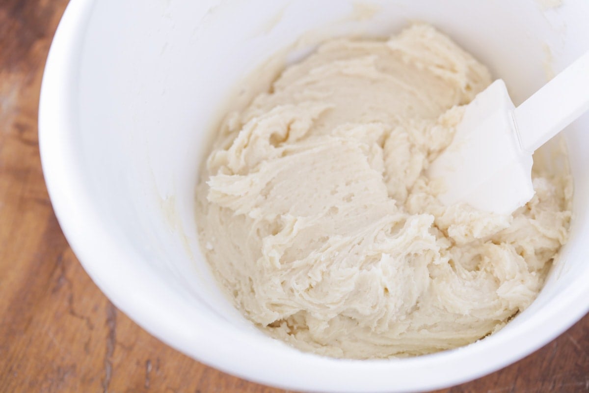 Cream cheese cookie recipe ingredients mixed in a bowl 