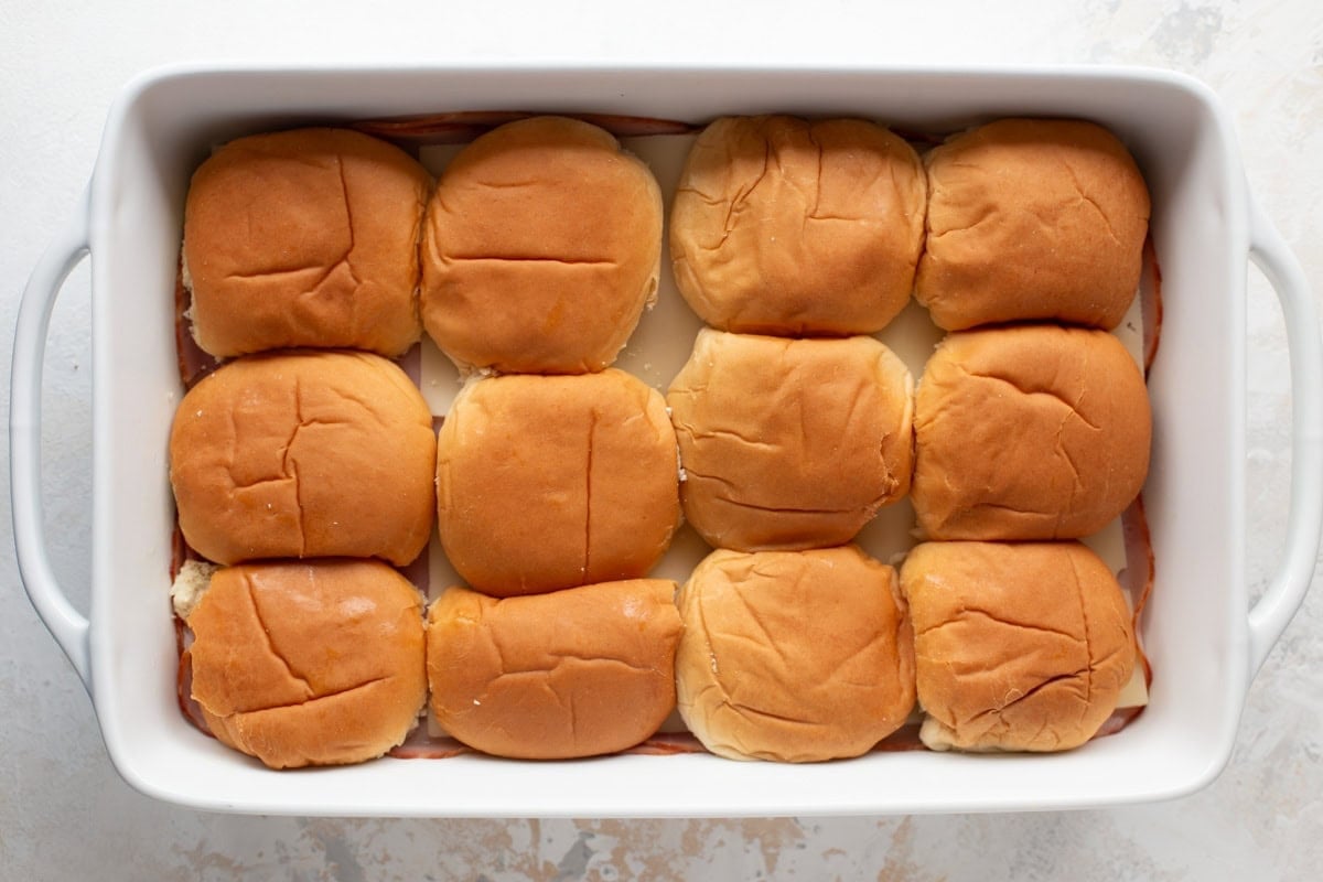 Rolls, meat, and cheese for sliders.