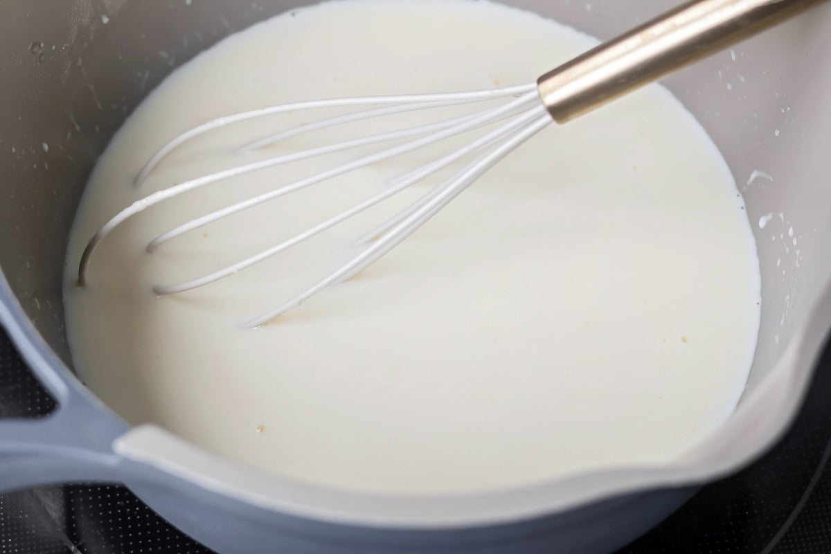 Making Bechamel sauce for Croque Monsieur sandwiches.