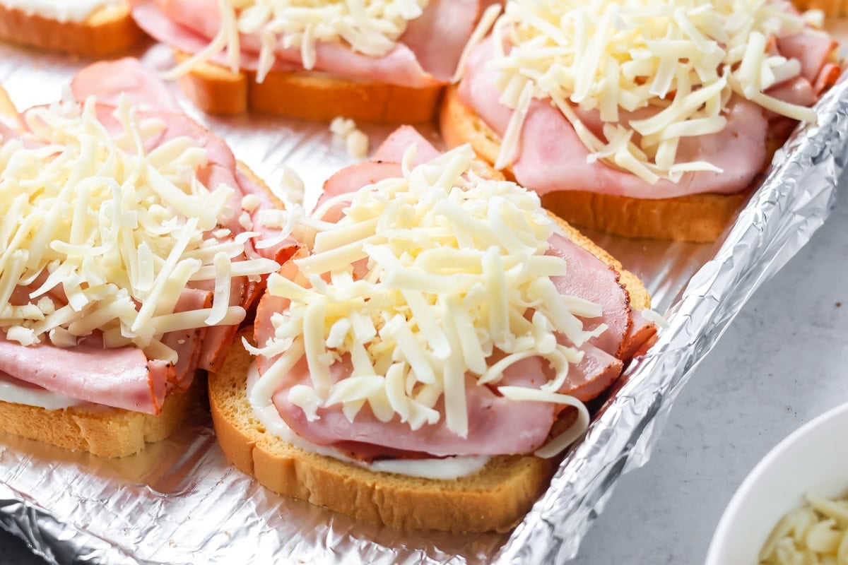 Bechamel sauce, ham and cheese on bread.