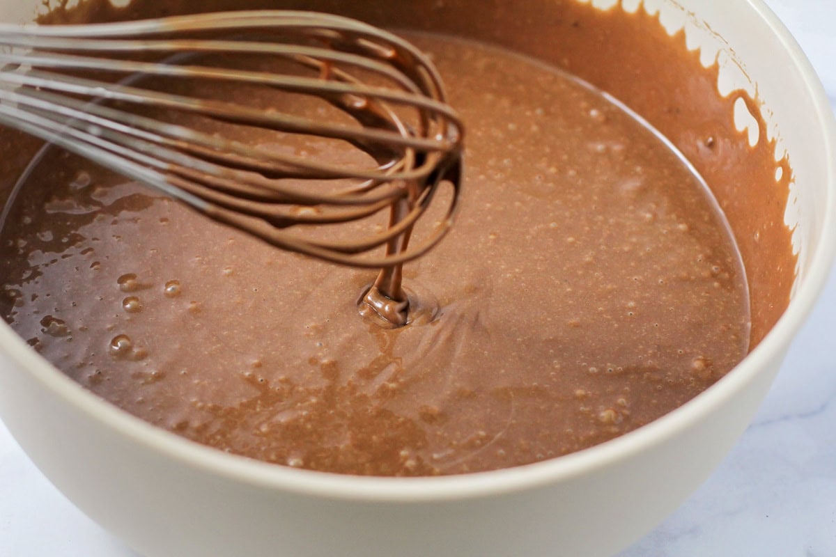 Chocolate cake batter in a bowl.