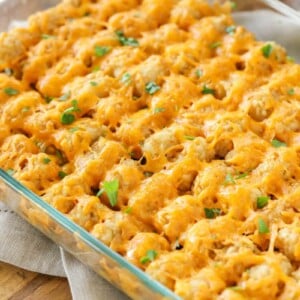 A casserole dish filled with hamburger tater tot casserole.