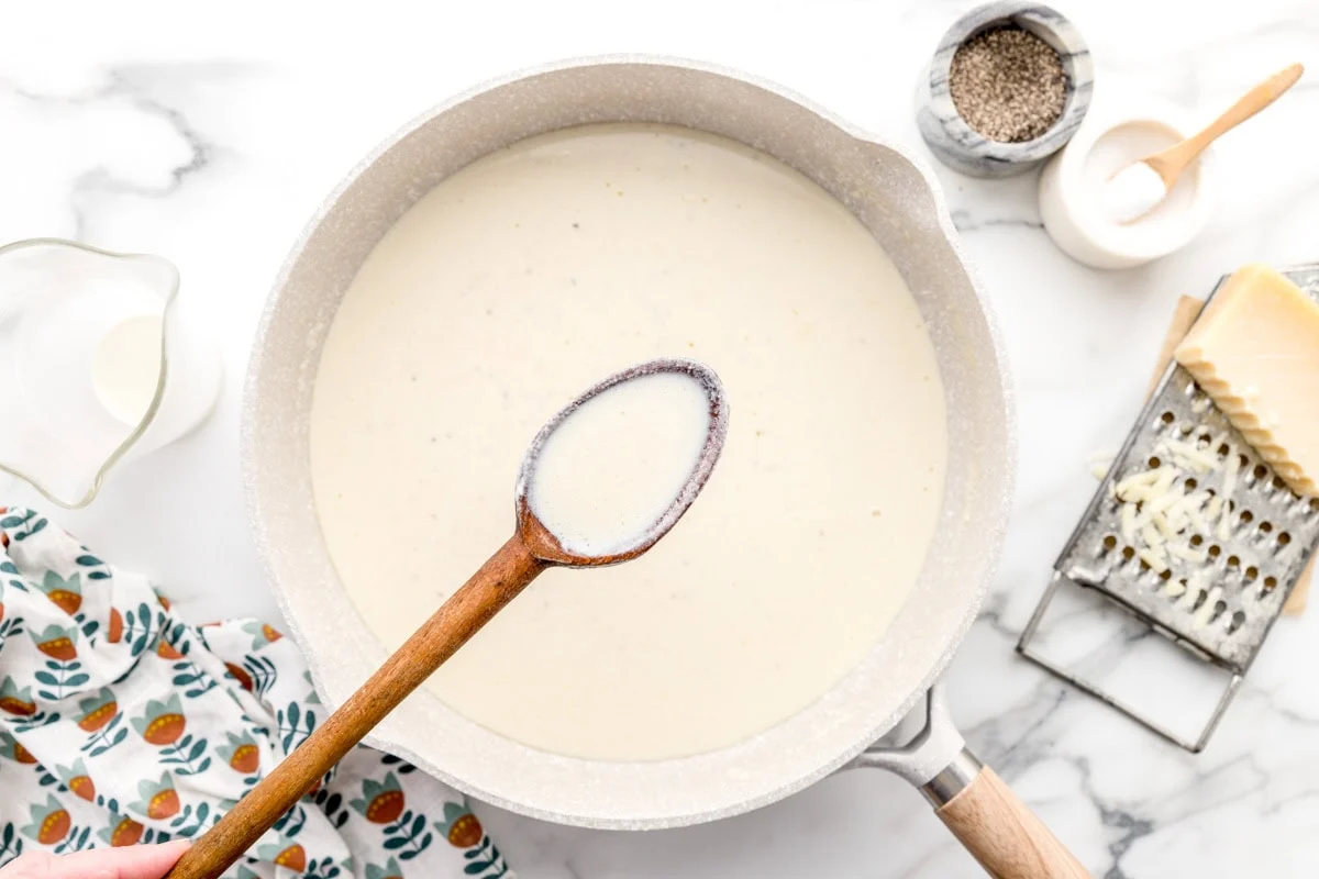 Homemade Alfredo sauce for chicken Alfredo pizza recipe.