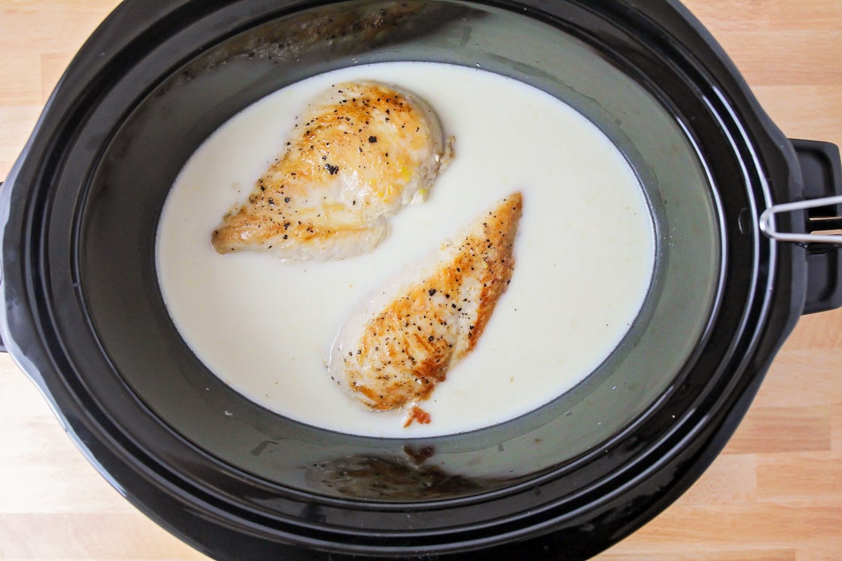 chicken and sauce in a crock pot
