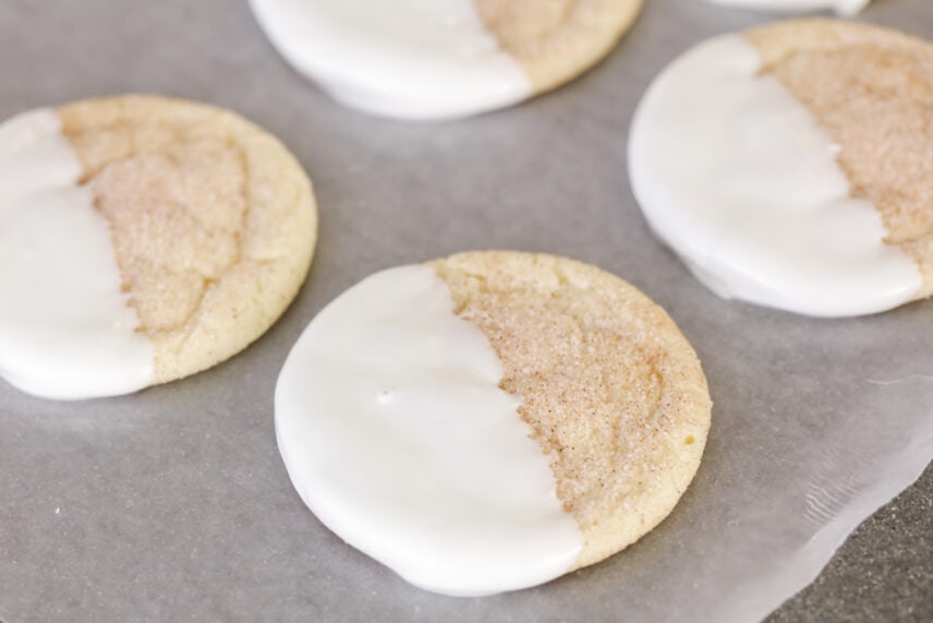 Snickerdoodles dipped half way in white chocolate.
