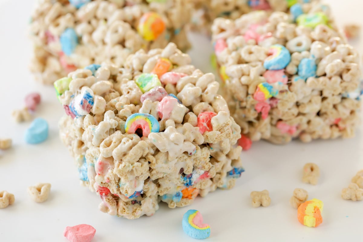 Lucky Charms treats sliced and served on a white counter.