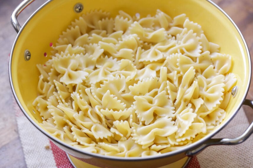 Bowtie pasta in colander