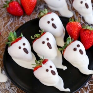 A black plate of strawberry ghosts.