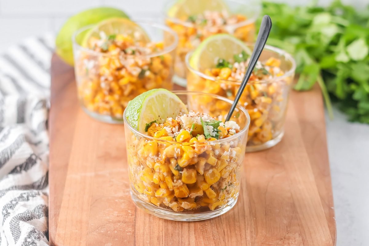 Esquites recipe (Mexican street corn cups) served in glass cups.