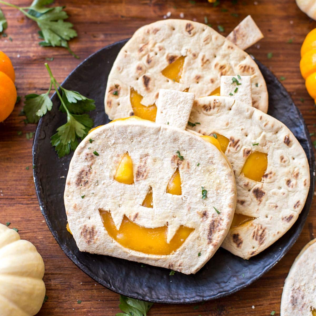 Pumpkin quesadillas shaped like pumpkins