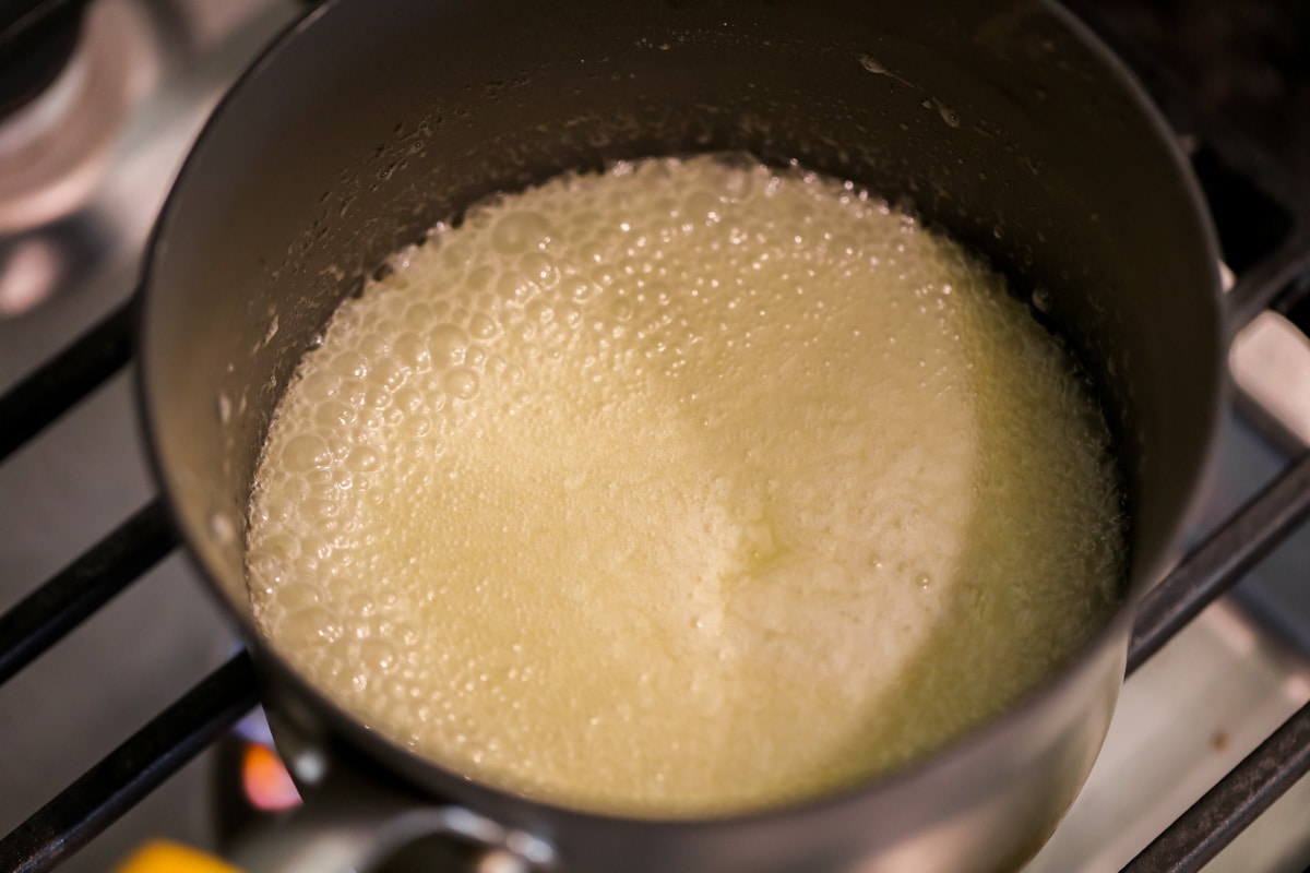 syrup cooking in a pan on the stove