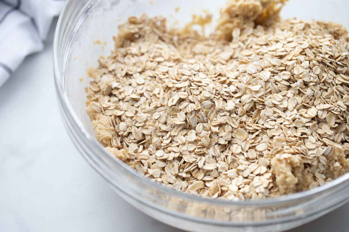 Adding oats to homemade oatmeal cookie dough