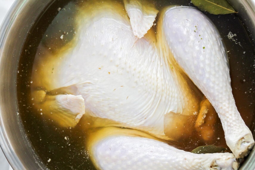Turkey brine creates an utterly tender and juicy bird bursting really good flavor for one mouth-watering bite after another! Whole turkey brined in a stock pot.