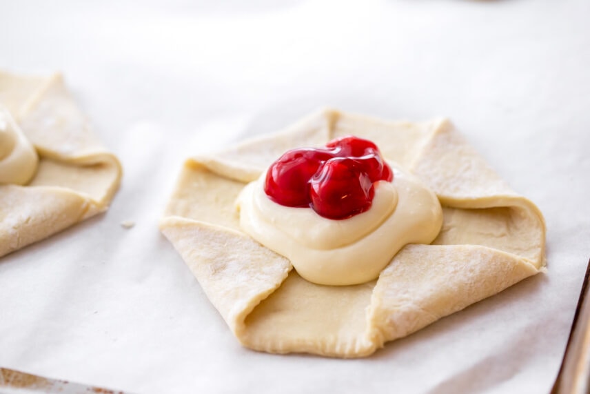 Assembling and filling a cream cheese cherry danish