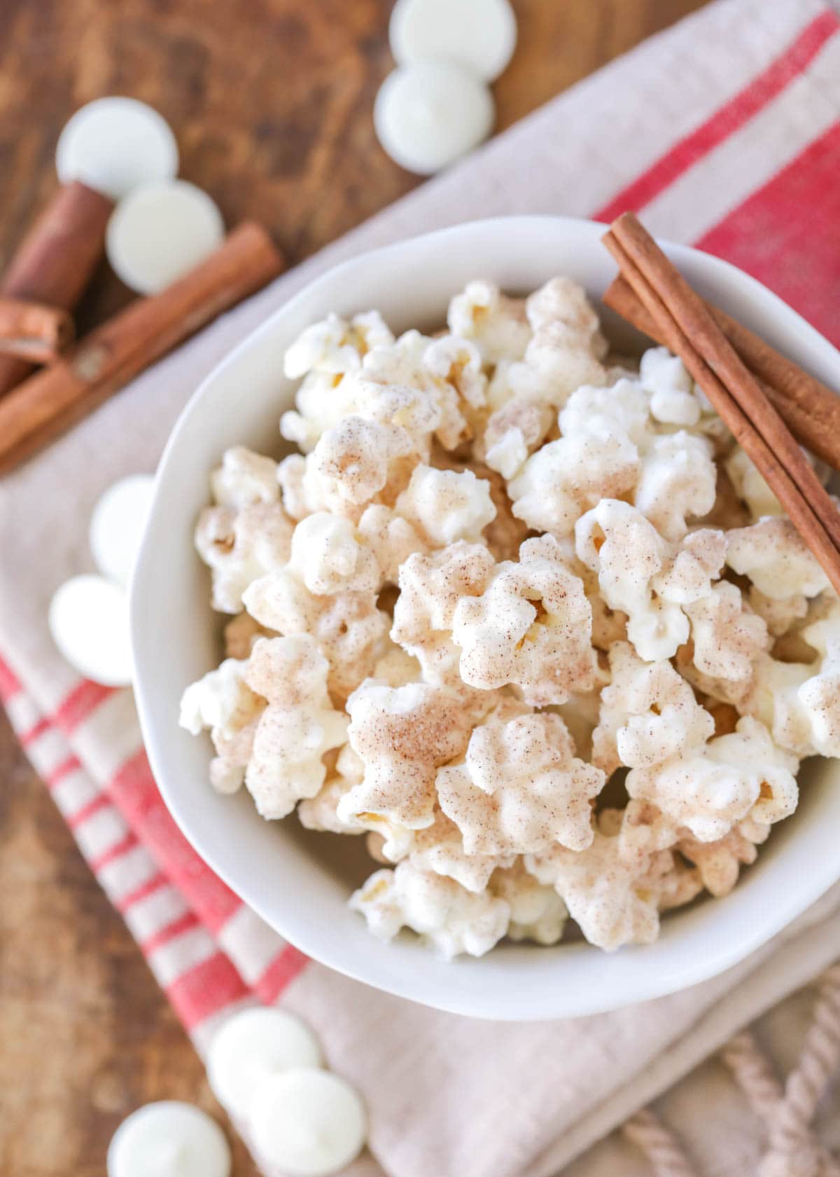Churro flavored popcorn in a white bowl