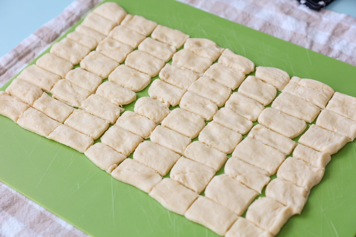Our wildly popular mini hotdogs require only TWO ingredients and make a perfect lunch, dinner, or party appetizer! Crescent dough cut into little rectangles.