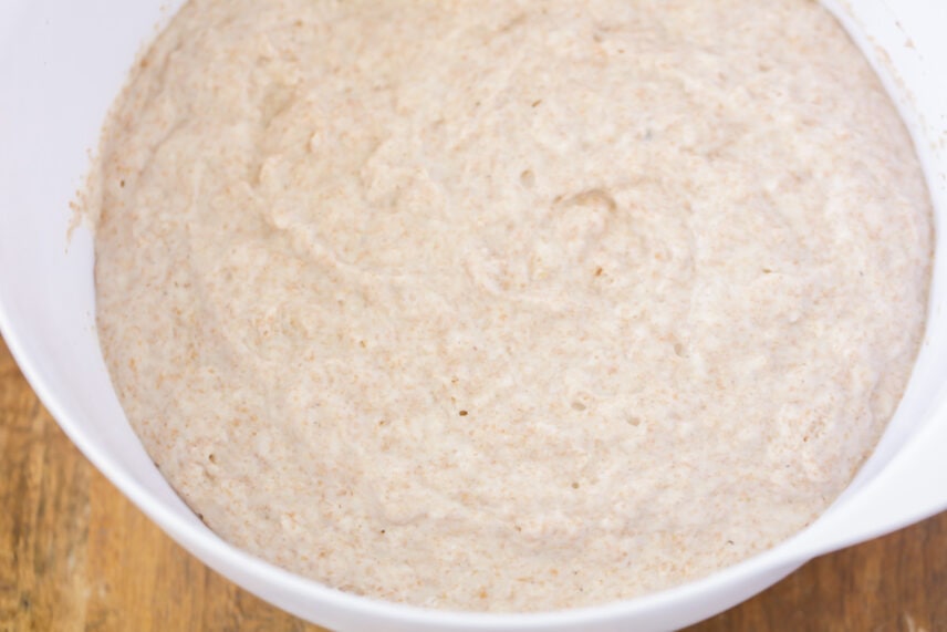 Batter in a white bowl for whole wheat pancakes