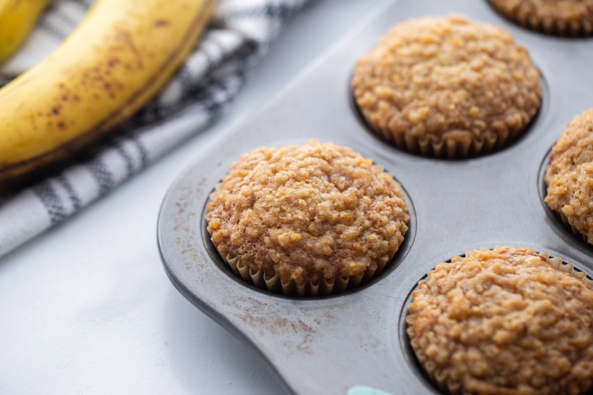 Baked muffins in a tin.