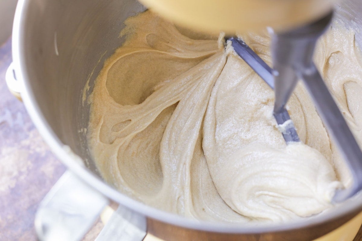 Mixing butterscotch cookie batter in a mixing bowl.