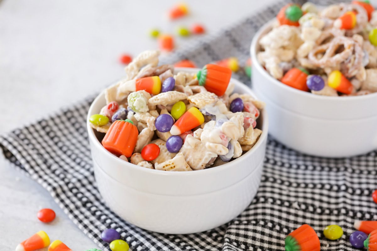 Halloween snack mix served in a white bowl.