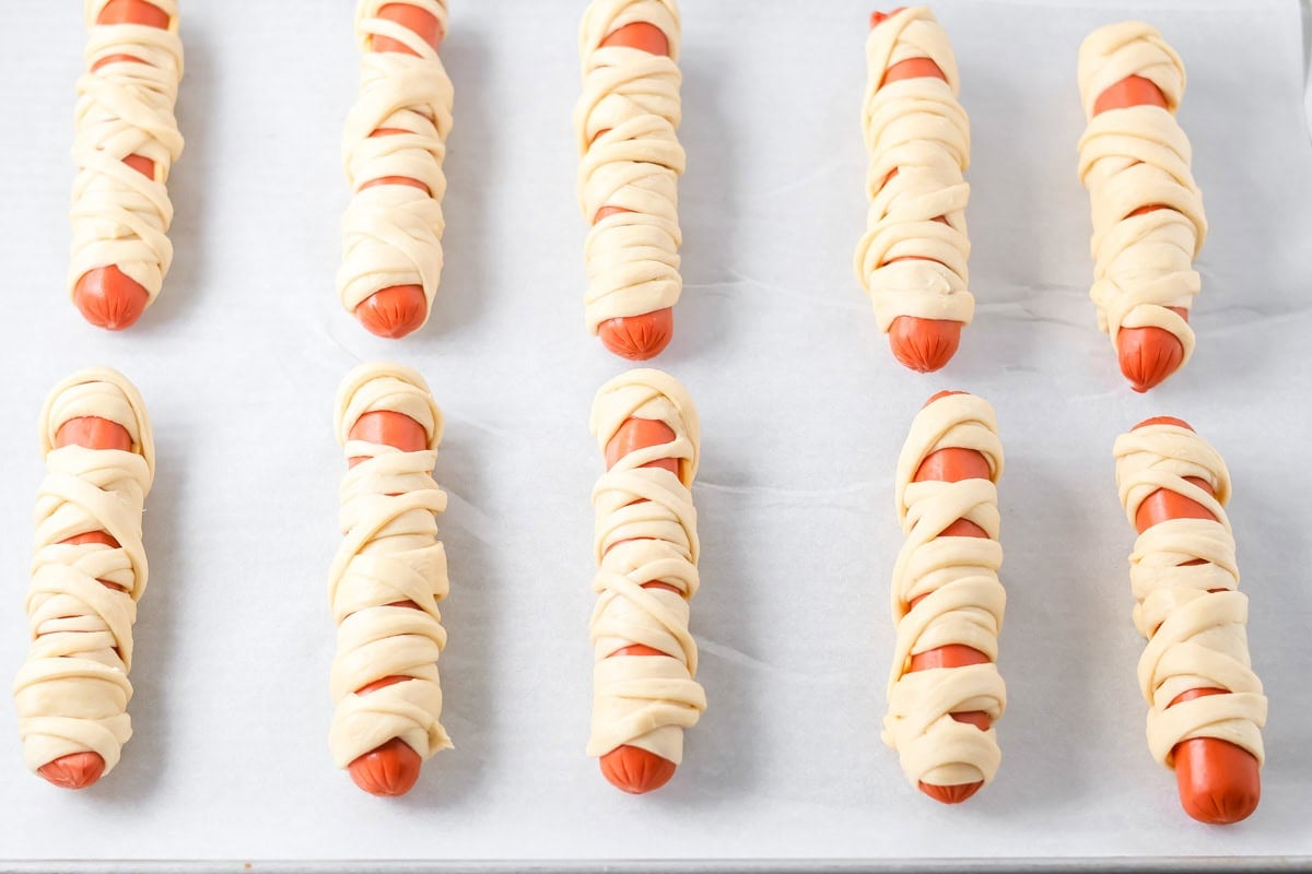 Crescent dough wrapped in hot dogs.