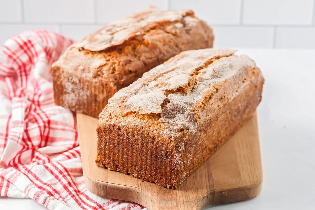 Amish friendship bread baked on cutting board.