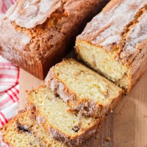 Amish friendship bread recipe sliced on cutting board.