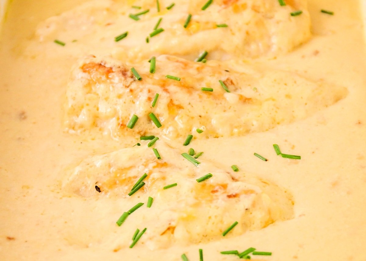 Sunday Dinner Ideas - Buttery baked chicken in a buttery sauce with fresh herbs.