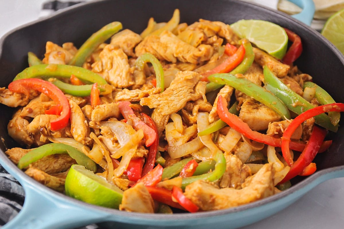 Fajita Marinade on chicken strips and bell peppers.