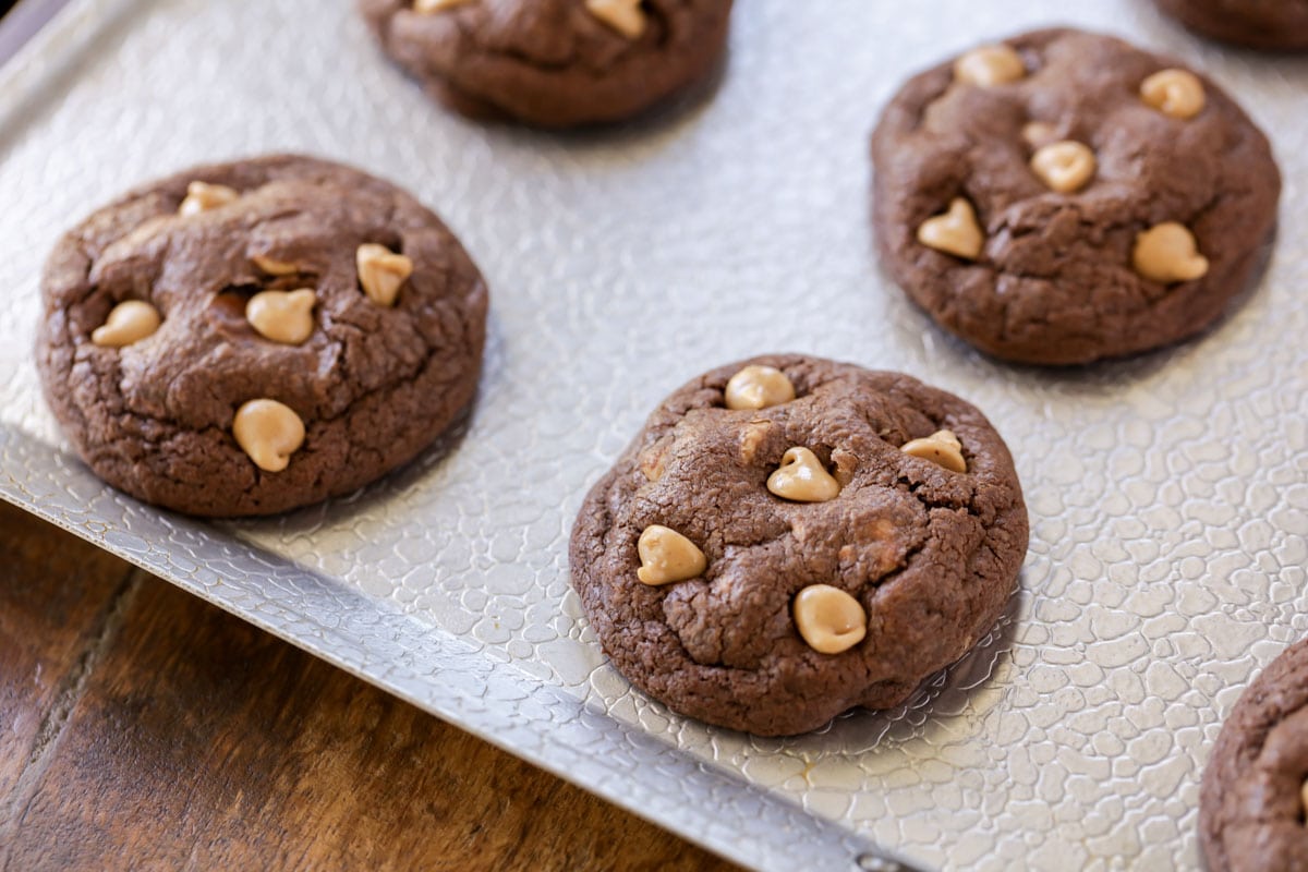 Chocolate Peanut Butter Cookies on a sheet pan.