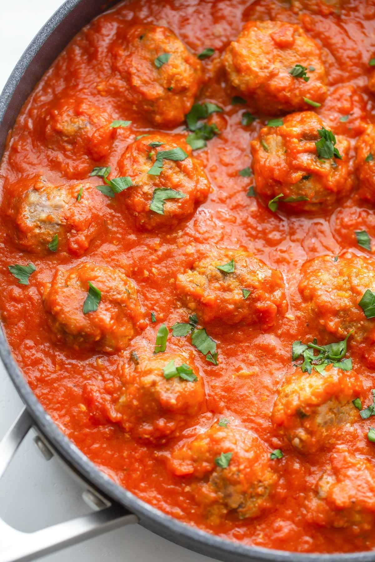 Italian meatballs recipe in pan with sauce