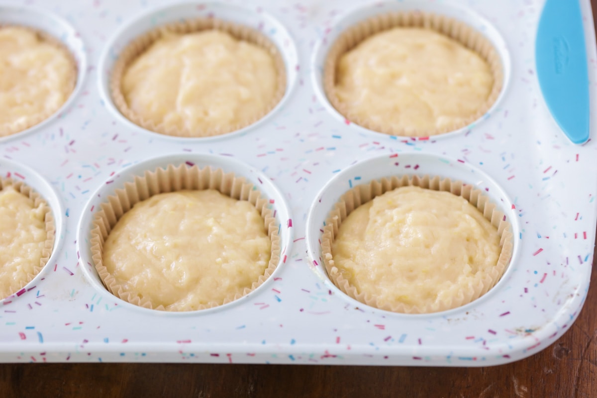 Lemon cupcakes batter in muffin tin