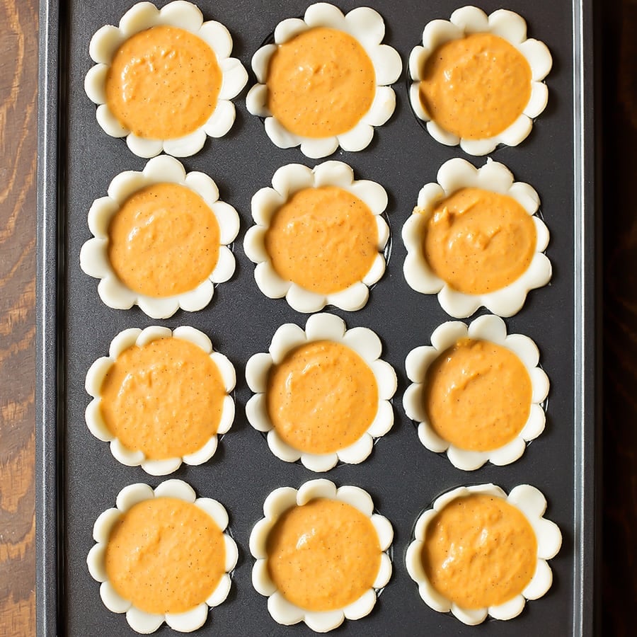 Pie crust minis filled with pumpkin pie filling.