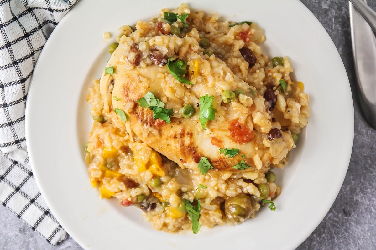 White plate filled with arroz con pollo