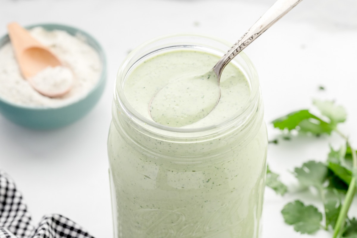 Mason jar filled with cafe rio cilantro ranch dressing