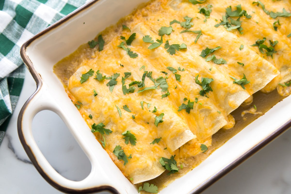 Green Chile Chicken Enchiladas in a 9x13 pan