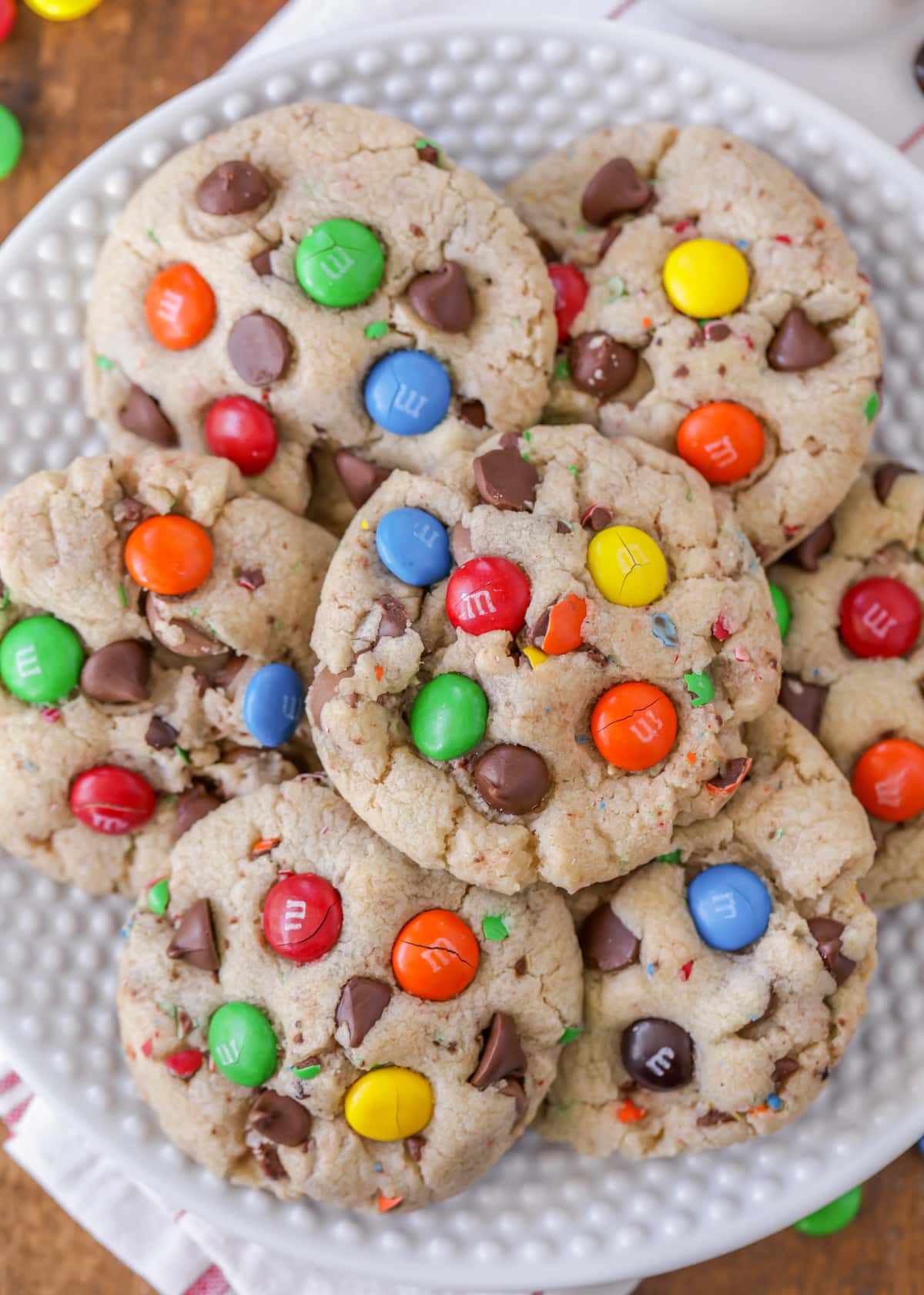 stack of chocolate chip m&m cookies on a plate
