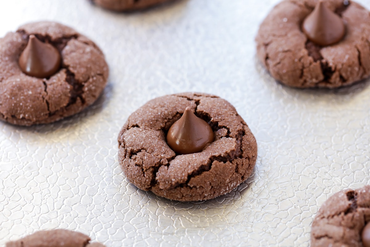Baking chocolate kiss cookies on a sheet pan