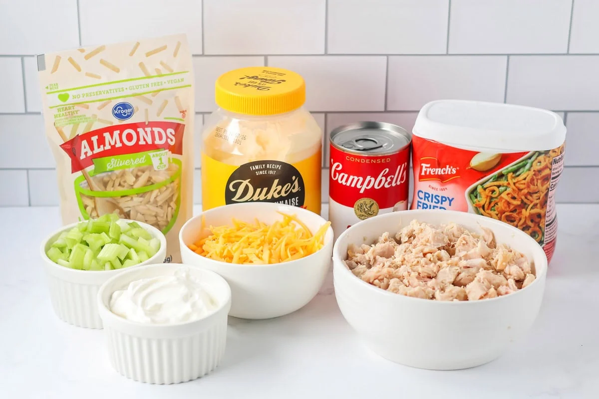 Ingredients for french onion chicken casserole on a kitchen counter.