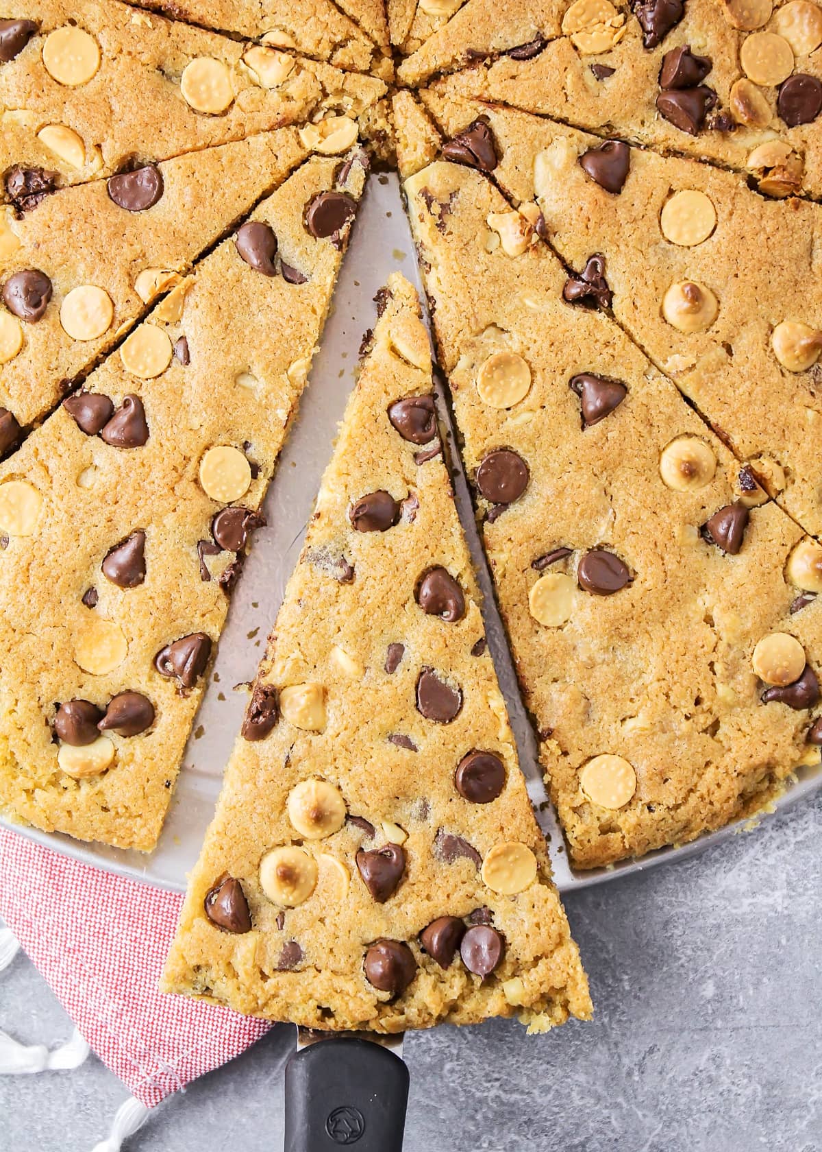 Sliced giant chocolate chip cookie.