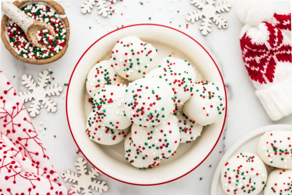 A bowl of decorated peanut butter snowballs.