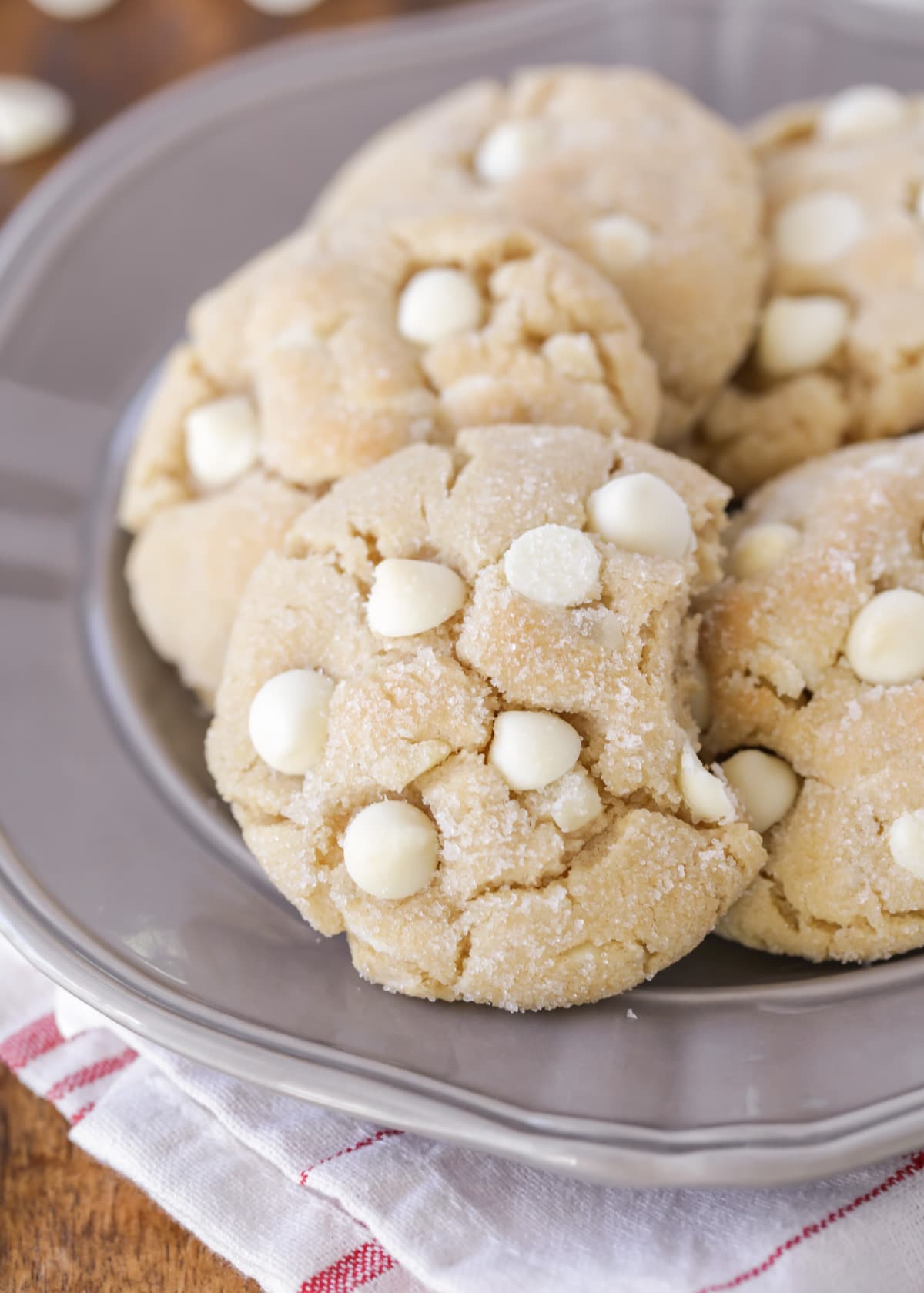 Plate filled with white chocolate crackle cookies