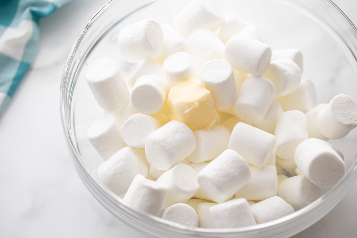 Marshmallows and butter in bowl