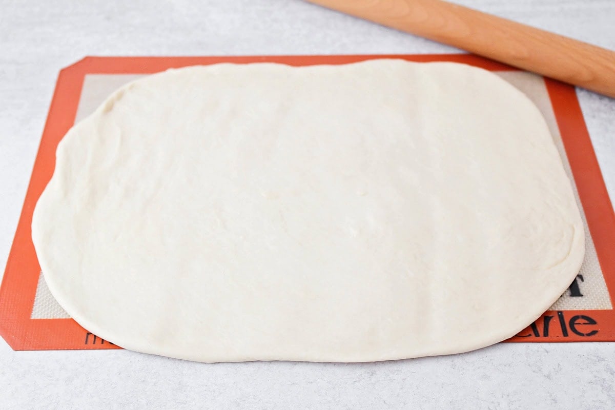 Rolling dough on a silpat mat.