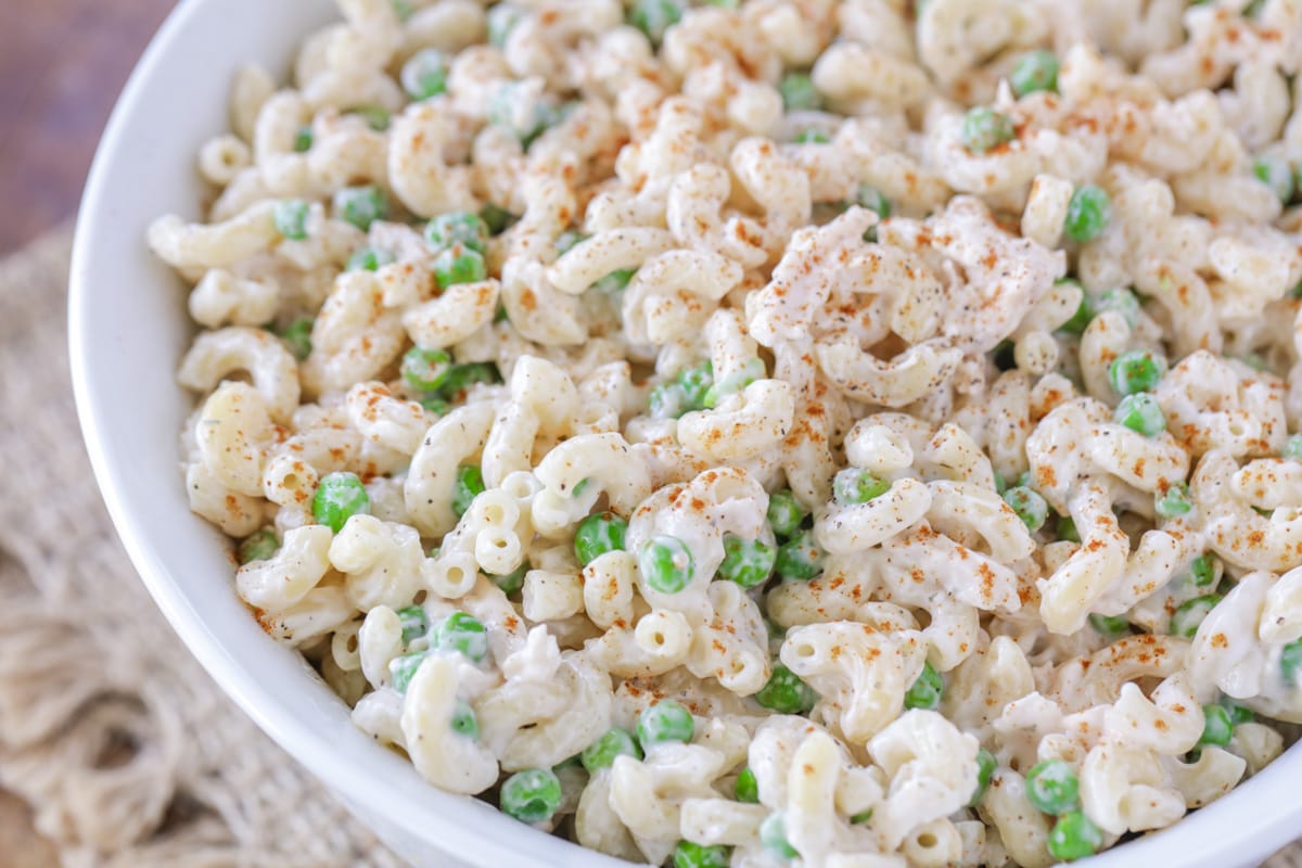 White bowl filled with chicken macaroni salad.